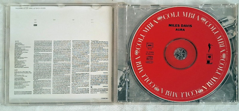 The remastered CD case opened.