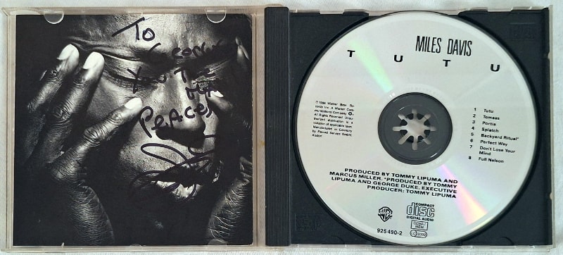 The standard CD silver CD and booklet. The autograph is Jason Miles’