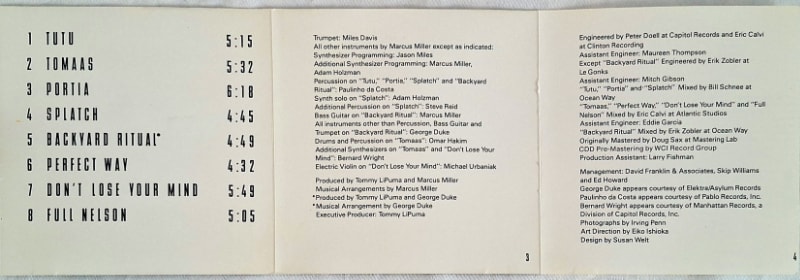The CD booklet folded out to reveal track and credits information.