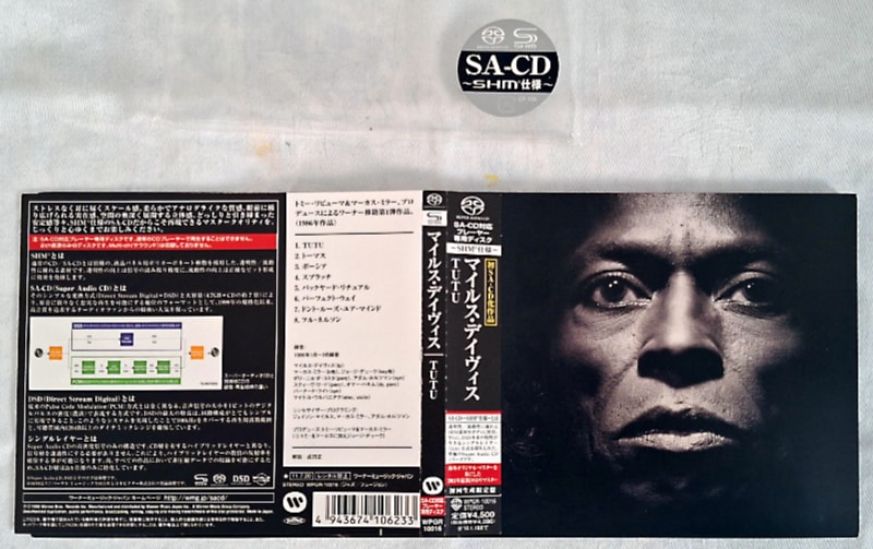 Cover and back – the release has a very large OBI strip with covers the back of the case.
