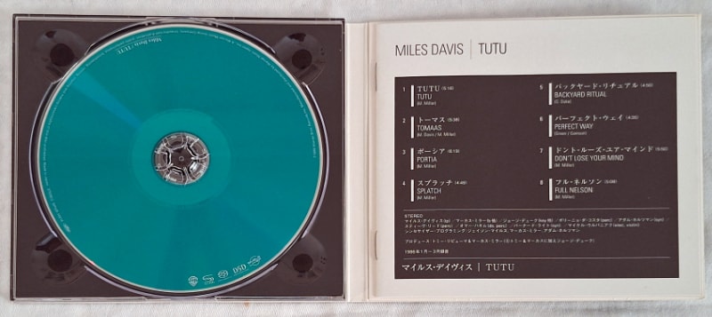 Inside the cover is the unusually coloured CD and booklet, which is attached to the CD case.