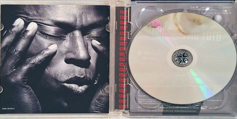 The disc comes in a strong, Super Jewel Box CD case, which is larger than a standard CD. This is the inside, with disc and booklet.