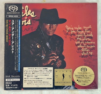 The Super Audio CD (SACD) came in a large, thick cardboard cover.
