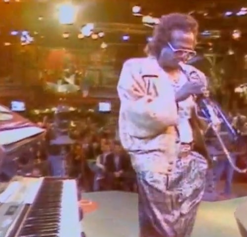 Miles Davis plays live on stage in Rome in 1989.