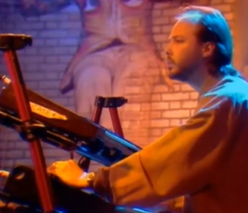 Keyboard player John Beasley plays on stage at a Miles Davis concert in 1989.