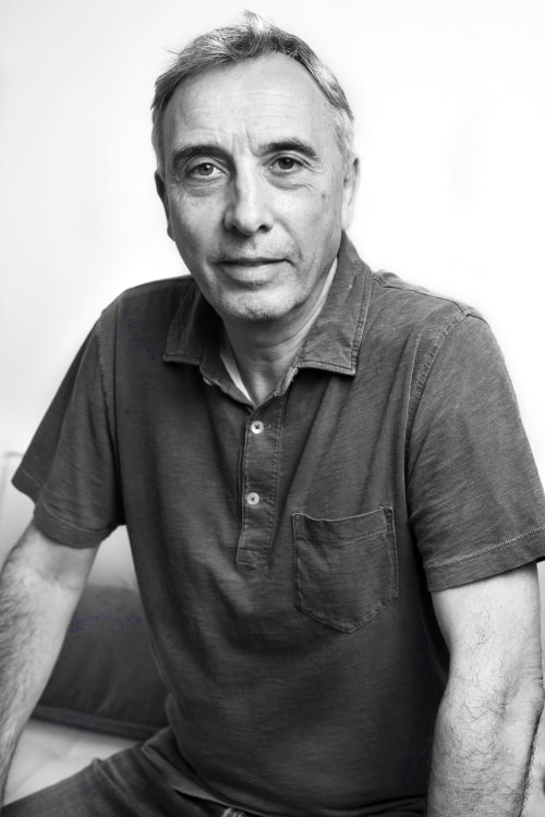Black and white portrait of the recording engineer Eric Calvi.