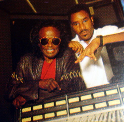 Easy Mo Bee/Miles Davis – This image of Miles and Easy Mo Bee in the studio was taken by Michael Benabib and used on the album’s liner notes