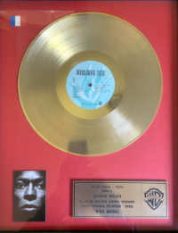 Miles Tutu gold record