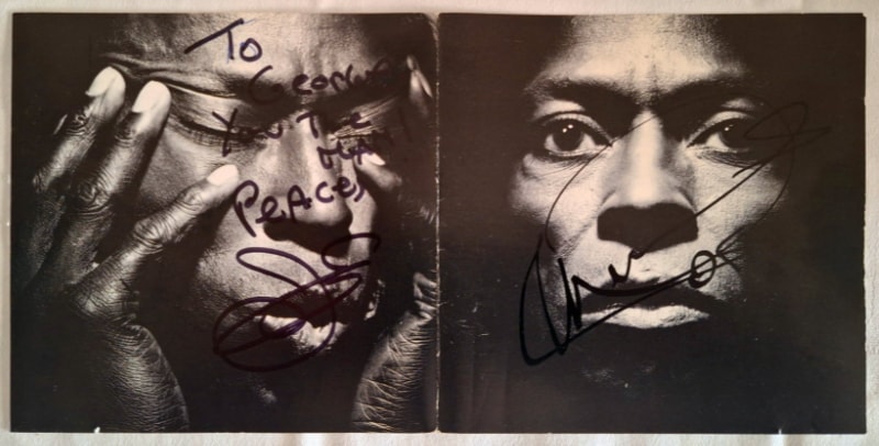 Miles Davis’ Tutu gatefold CD cover signed by Jason Miles and Marcus Miller.