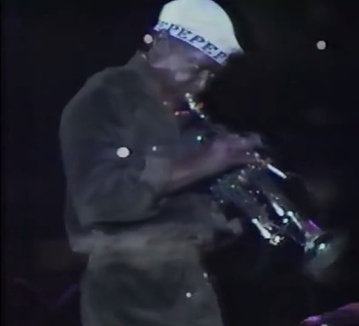 Miles with horn and cigarette in Tokyo, October 1981